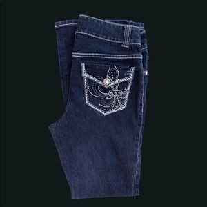 black bootcut jeans with detailed pockets